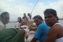 Sri Baba along with members going by boat to places unreachable by road